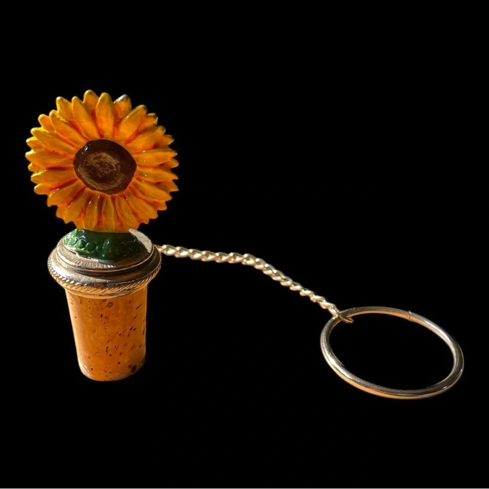 Vintage wine bottle cork stopper, with a pewter, painted, sunflower on top
